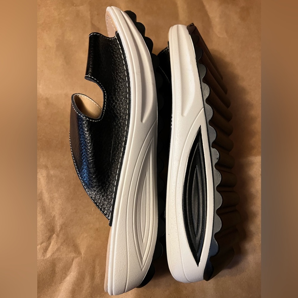 Black slide on sandals